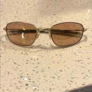 Oakley Gold Sunglasses with Brown Lenses